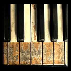 Happiness is a piano and a microphone...